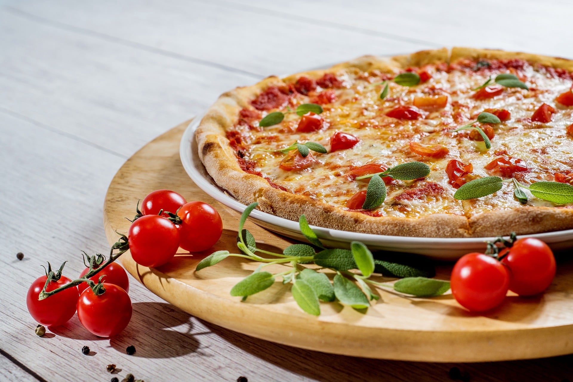 Freshly baked pizza in a warm IvoralenessiQue setting